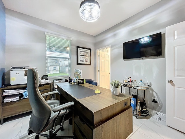 office area with marble finish floor