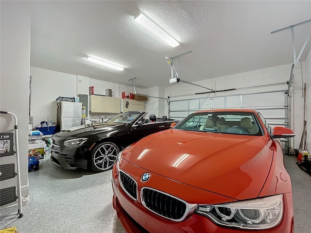 garage with freestanding refrigerator