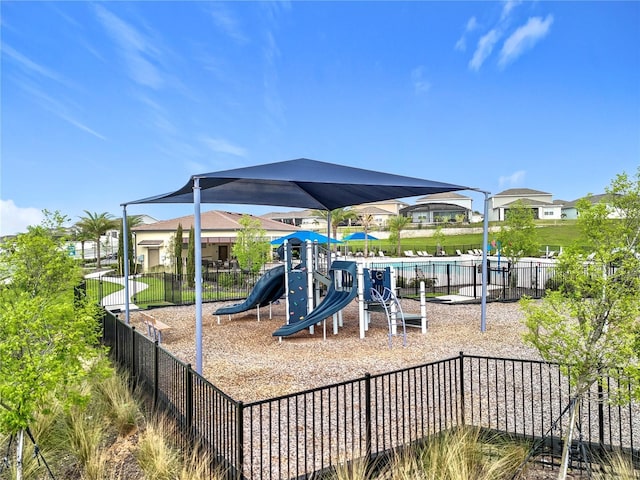 community playground featuring fence