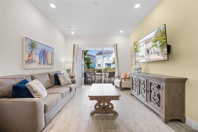 8012 Lost Shaker Ln, Kissimmee, FL 34747 - living room with recessed lighting, baseboards, and wood finish floors