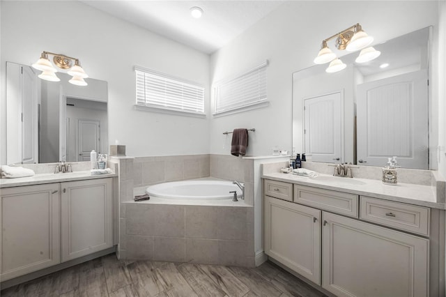 8012 Lost Shaker Ln, Kissimmee, FL 34747 - full bathroom featuring a sink, two vanities, and a bath