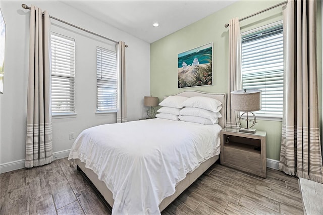 8012 Lost Shaker Ln, Kissimmee, FL 34747 - bedroom featuring wood finished floors and baseboards