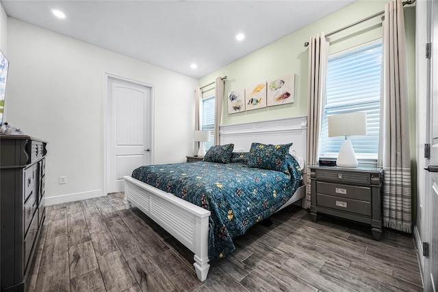 8012 Lost Shaker Ln, Kissimmee, FL 34747 - bedroom with recessed lighting, baseboards, and wood finished floors