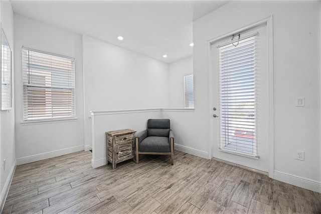 8012 Lost Shaker Ln, Kissimmee, FL 34747 - living area featuring plenty of natural light, wood finished floors, and recessed lighting