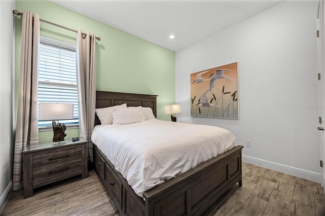 8012 Lost Shaker Ln, Kissimmee, FL 34747 - bedroom with recessed lighting, baseboards, and light wood-style flooring