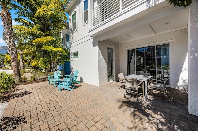 8012 Lost Shaker Ln, Kissimmee, FL 34747 - view of patio / terrace with outdoor dining area