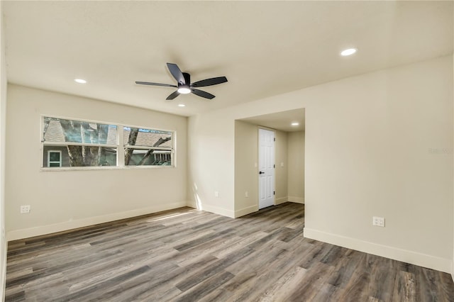 628 Eastwood Ct, Altamonte Springs, FL 32714 - unfurnished room with baseboards, wood finished floors, and recessed lighting