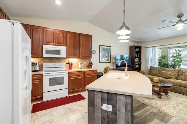 kitchen with white appliances, tasteful backsplash, open floor plan, vaulted ceiling, and light countertops