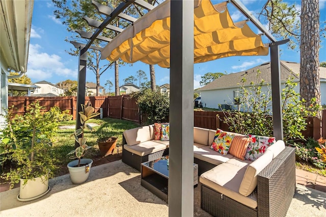 view of patio featuring a fenced backyard, an outdoor hangout area, and a pergola