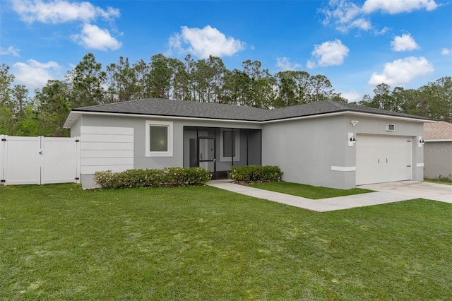 single story home featuring a garage, concrete driveway, a gate, stucco siding, and a front lawn