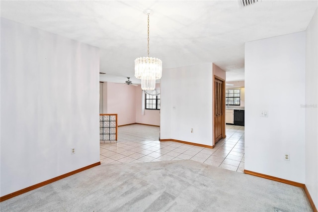 unfurnished room featuring light tile patterned floors, a chandelier, light carpet, visible vents, and baseboards