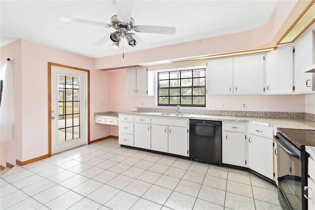 kitchen with a wealth of natural light, light countertops, black appliances, and white cabinetry