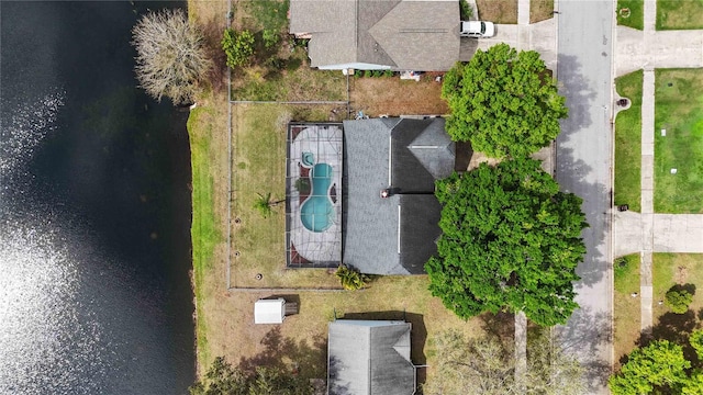 birds eye view of property featuring a water view