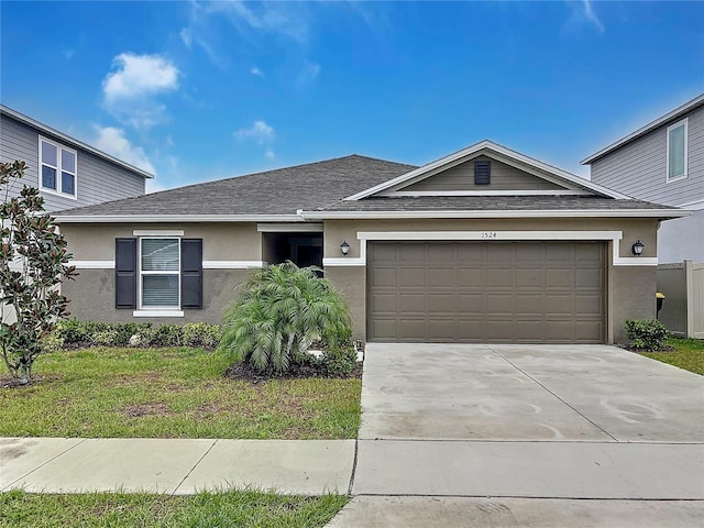 ranch-style house featuring a shingled roof, a front lawn, an attached garage, and stucco siding