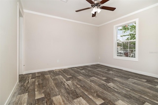 spare room with dark wood-style floors, ceiling fan, ornamental molding, and baseboards