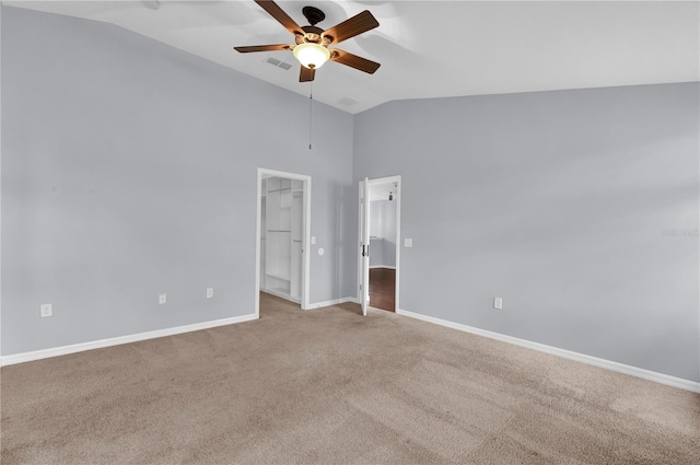 923 Tramells Trl, Kissimmee, FL 34744 - spare room featuring baseboards, visible vents, a ceiling fan, light colored carpet, and lofted ceiling