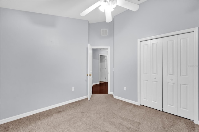 923 Tramells Trl, Kissimmee, FL 34744 - unfurnished bedroom featuring baseboards, visible vents, a ceiling fan, carpet flooring, and a closet