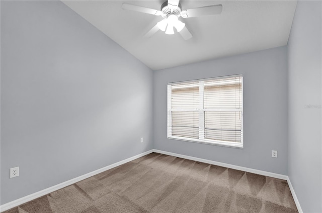 923 Tramells Trl, Kissimmee, FL 34744 - carpeted spare room featuring vaulted ceiling, ceiling fan, and baseboards