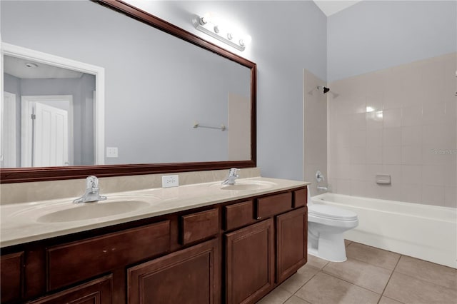 923 Tramells Trl, Kissimmee, FL 34744 - full bath with toilet, tile patterned flooring, washtub / shower combination, and a sink