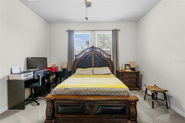 bedroom with light carpet, ceiling fan, and baseboards