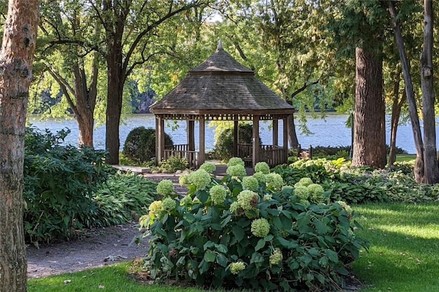 view of property's community featuring a gazebo and a water view