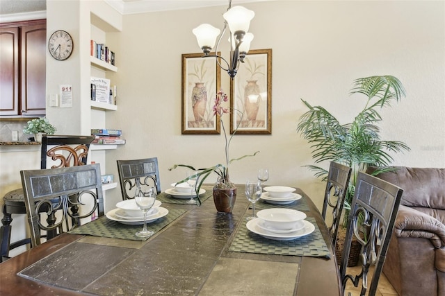 dining area featuring a chandelier