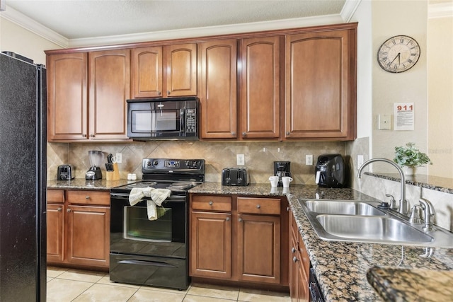 kitchen featuring a sink, black appliances, tasteful backsplash, dark stone countertops, and crown molding