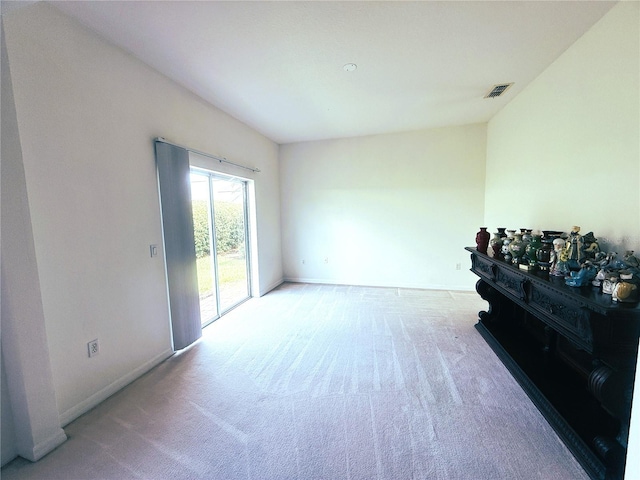 318 Rock Springs Dr, Poinciana, FL 34759 - living room with light carpet and baseboards