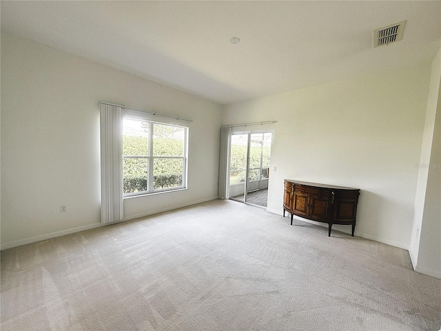 318 Rock Springs Dr, Poinciana, FL 34759 - unfurnished bedroom with access to outside, carpet, and baseboards