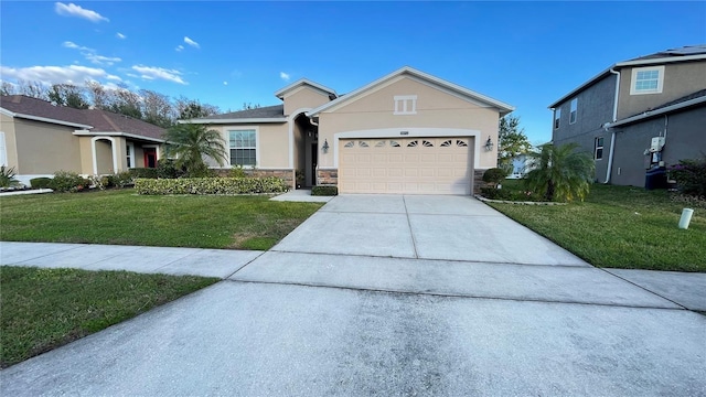 ranch-style home featuring a garage, driveway, stone siding, stucco siding, and a front yard