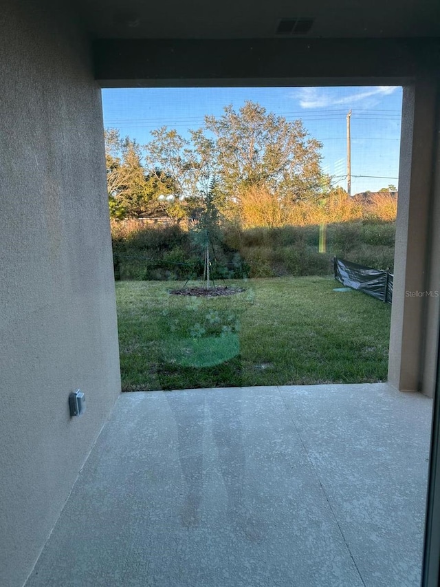 view of patio with visible vents