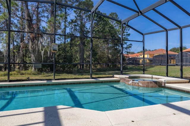 113 Tiger Lily Ct, Davenport, FL 33837 - view of pool with glass enclosure and a pool with connected hot tub