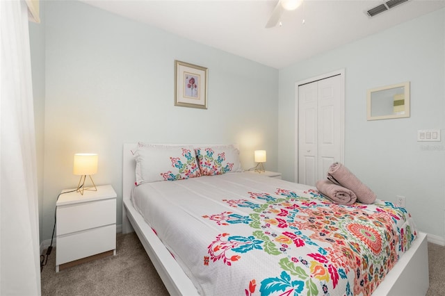 113 Tiger Lily Ct, Davenport, FL 33837 - carpeted bedroom featuring a closet, baseboards, and a ceiling fan