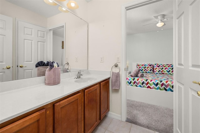 113 Tiger Lily Ct, Davenport, FL 33837 - bathroom with tile patterned floors, vanity, and ceiling fan