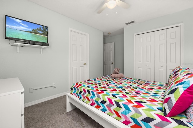 113 Tiger Lily Ct, Davenport, FL 33837 - carpeted bedroom with a closet, a ceiling fan, and baseboards