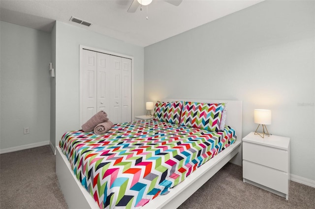 113 Tiger Lily Ct, Davenport, FL 33837 - carpeted bedroom with a closet, baseboards, and ceiling fan