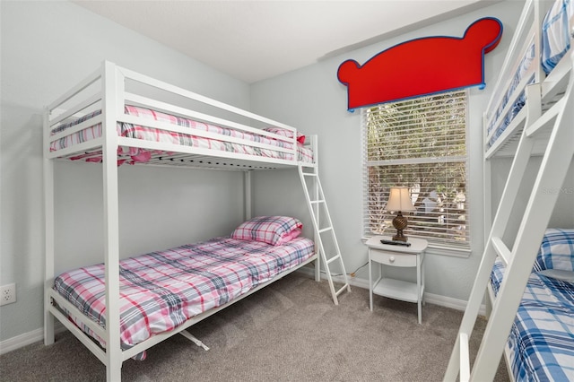 113 Tiger Lily Ct, Davenport, FL 33837 - carpeted bedroom featuring baseboards