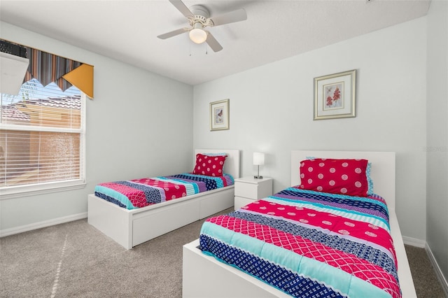 113 Tiger Lily Ct, Davenport, FL 33837 - bedroom with carpet, baseboards, and a ceiling fan