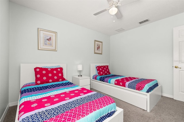 113 Tiger Lily Ct, Davenport, FL 33837 - bedroom featuring carpet flooring, baseboards, and a ceiling fan
