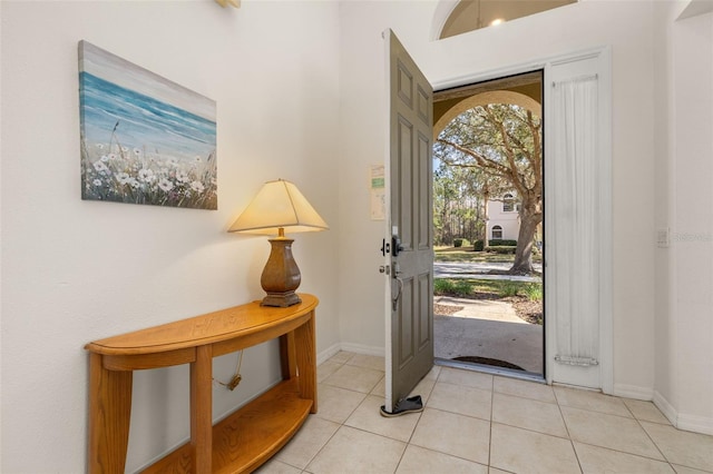 113 Tiger Lily Ct, Davenport, FL 33837 - entryway featuring baseboards and light tile patterned floors