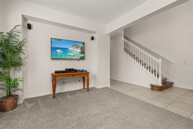 113 Tiger Lily Ct, Davenport, FL 33837 - tiled living area featuring stairs, carpet, and baseboards