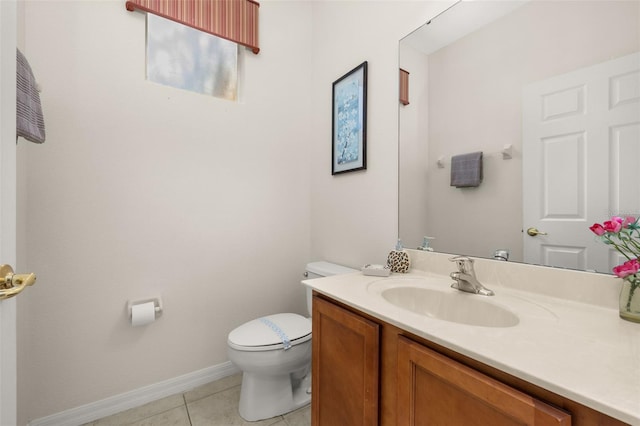113 Tiger Lily Ct, Davenport, FL 33837 - half bathroom with toilet, vanity, tile patterned floors, and baseboards