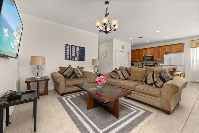113 Tiger Lily Ct, Davenport, FL 33837 - living room featuring a chandelier, light tile patterned floors, and recessed lighting
