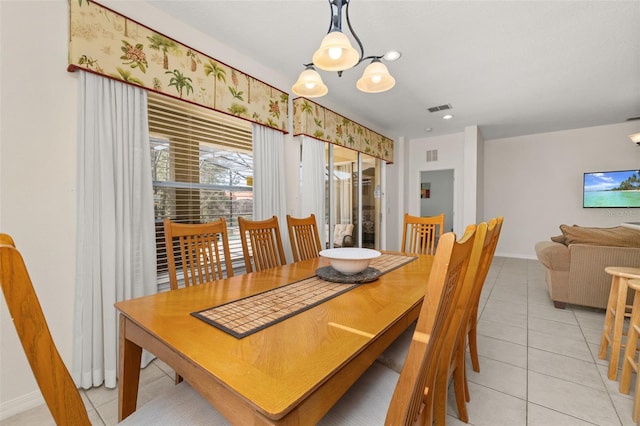 113 Tiger Lily Ct, Davenport, FL 33837 - dining area featuring light tile patterned flooring, baseboards, and recessed lighting