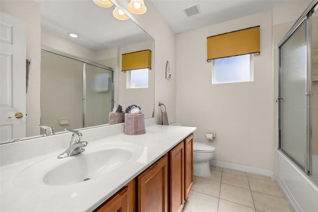 113 Tiger Lily Ct, Davenport, FL 33837 - full bath featuring plenty of natural light, vanity, toilet, and tile patterned floors