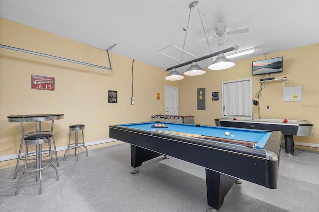 113 Tiger Lily Ct, Davenport, FL 33837 - playroom with billiards, baseboards, ceiling fan, and concrete flooring