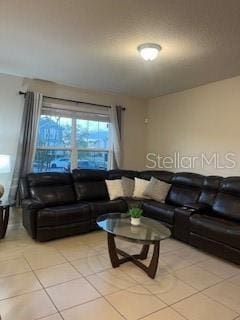 living area with light tile patterned floors