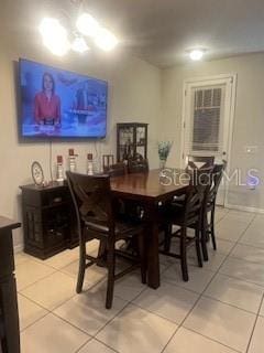 dining room with light tile patterned floors