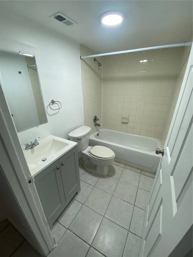 full bath featuring shower / bathtub combination, toilet, vanity, visible vents, and tile patterned floors