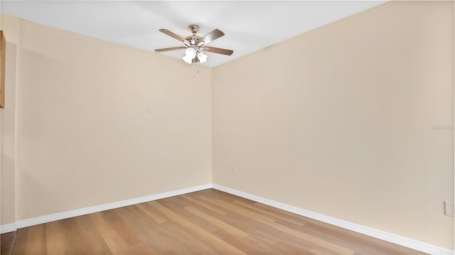 1695 Lee Rd Unit E103, Winter Park, FL 32789 - spare room featuring baseboards, light wood-type flooring, and a ceiling fan